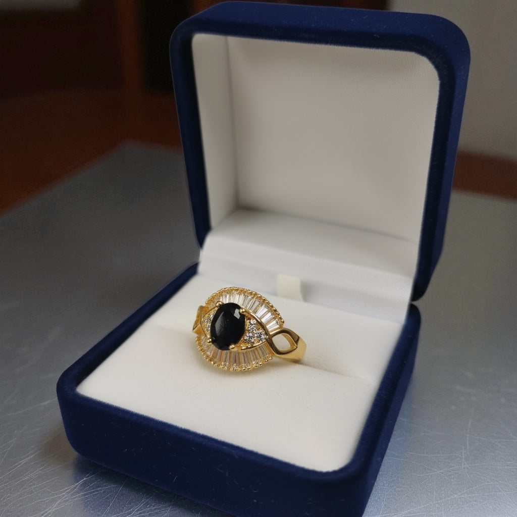 Elegant Gold-Tone Ring with Black Stone